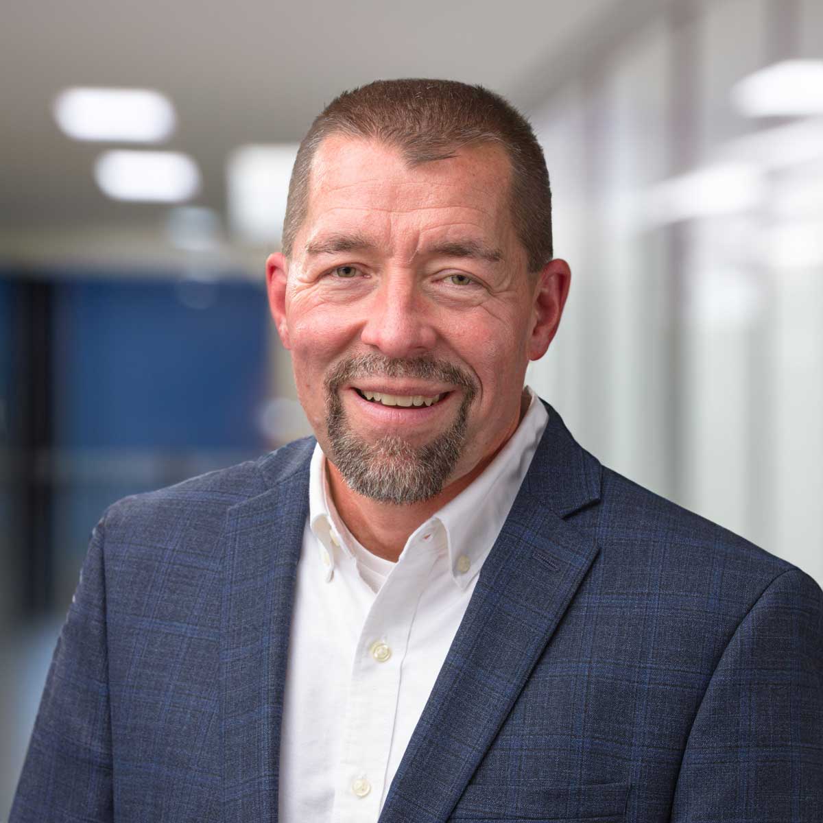 Mike Crandall with office background